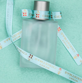 注文のParfumsのギフトのパッキング リボン、ホイルが付いている金9mmポリエステル サテンのリボン
